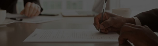 professionals handling paperwork